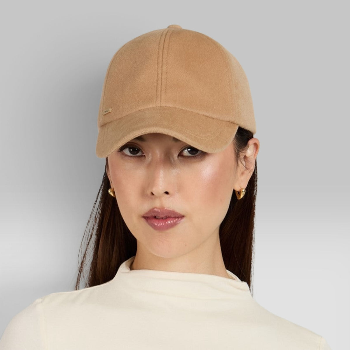 Lo Cap by Eugenia Kim, cashmere cap with 14KT gold logo plate, view 1