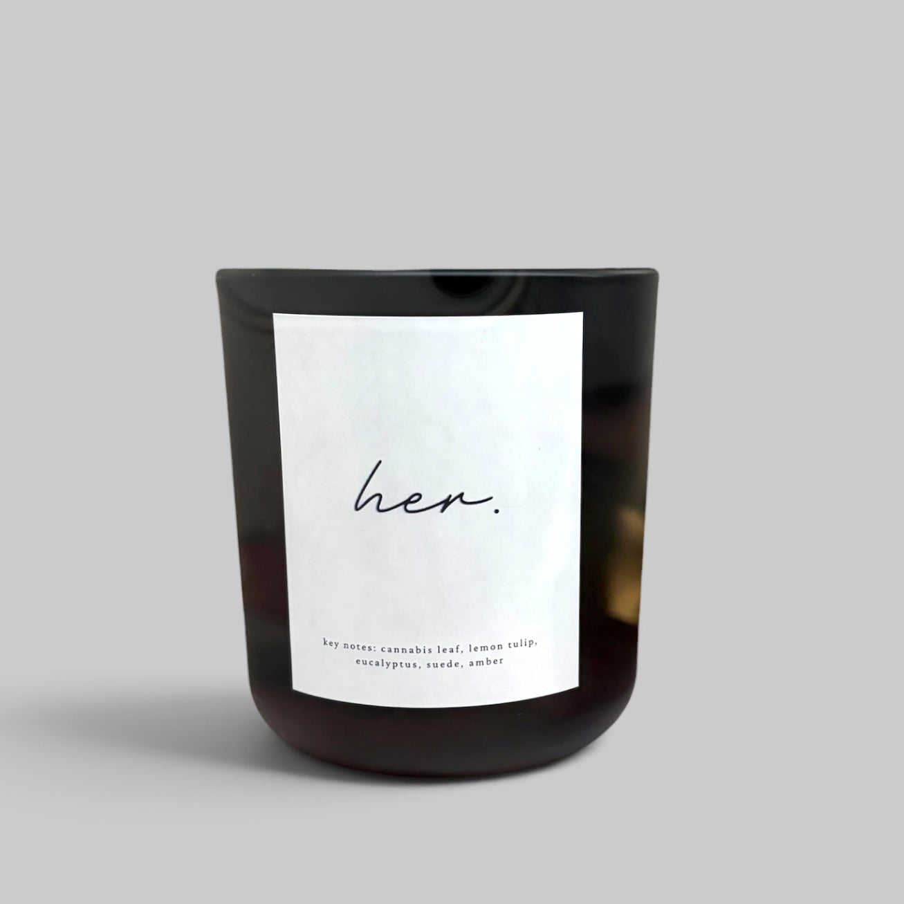her. Candle, detail of the vessel and label