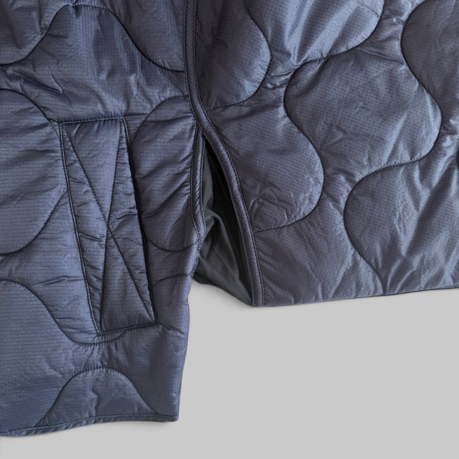 Iona Quilted Jacket by Agolde in Ink, styled view