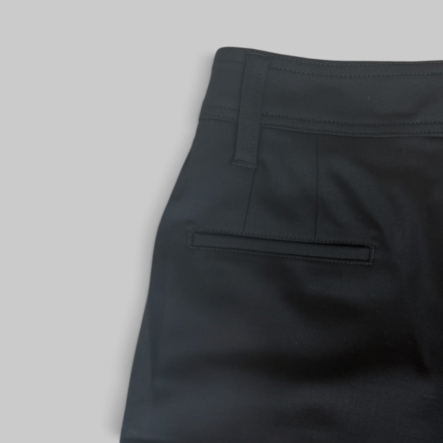 Single Pleat Front Trouser in Black by Maria McManus, side view