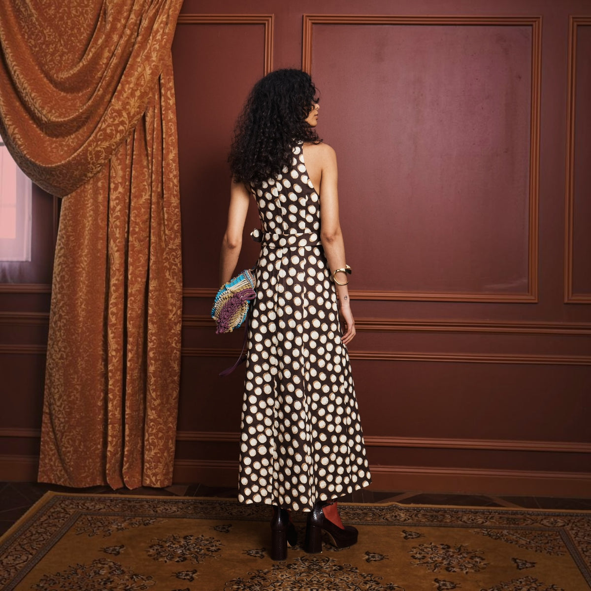 Paula Midi Dress by Alémais, styled view